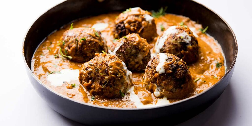 Malai kofta, grøntsagsfrikadeller med sauce
